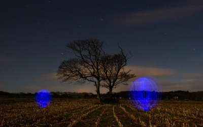 blue-orbs-by-tree-1-1-featured